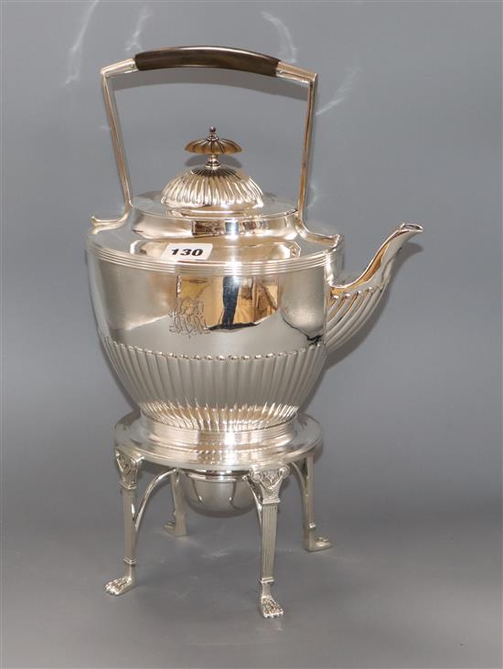 A silver-plated Elkingtons kettle on stand